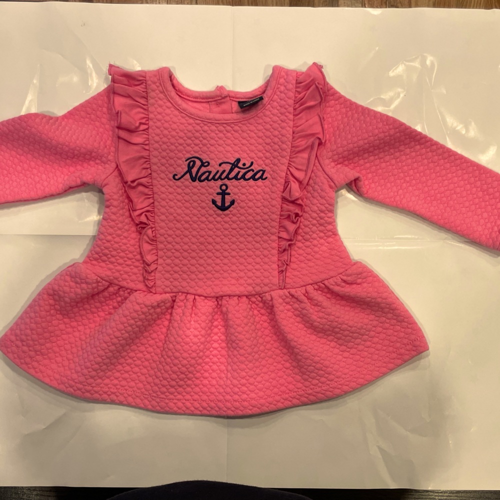 Baby dress new with out tags pink 12 months